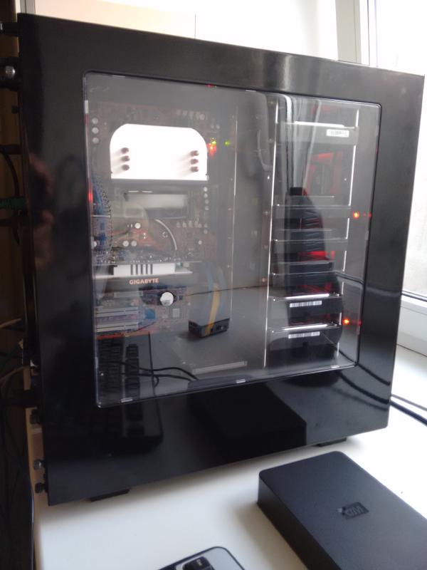The server box running a more sensible setup of less than 8 hard drives.