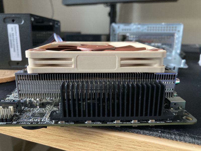Low profile Noctua cooler: looks good, is quiet and keeps the system cool.