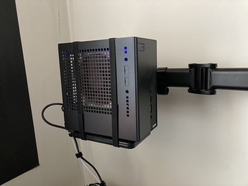 DeskMini X300 mounted on a monitor arm.