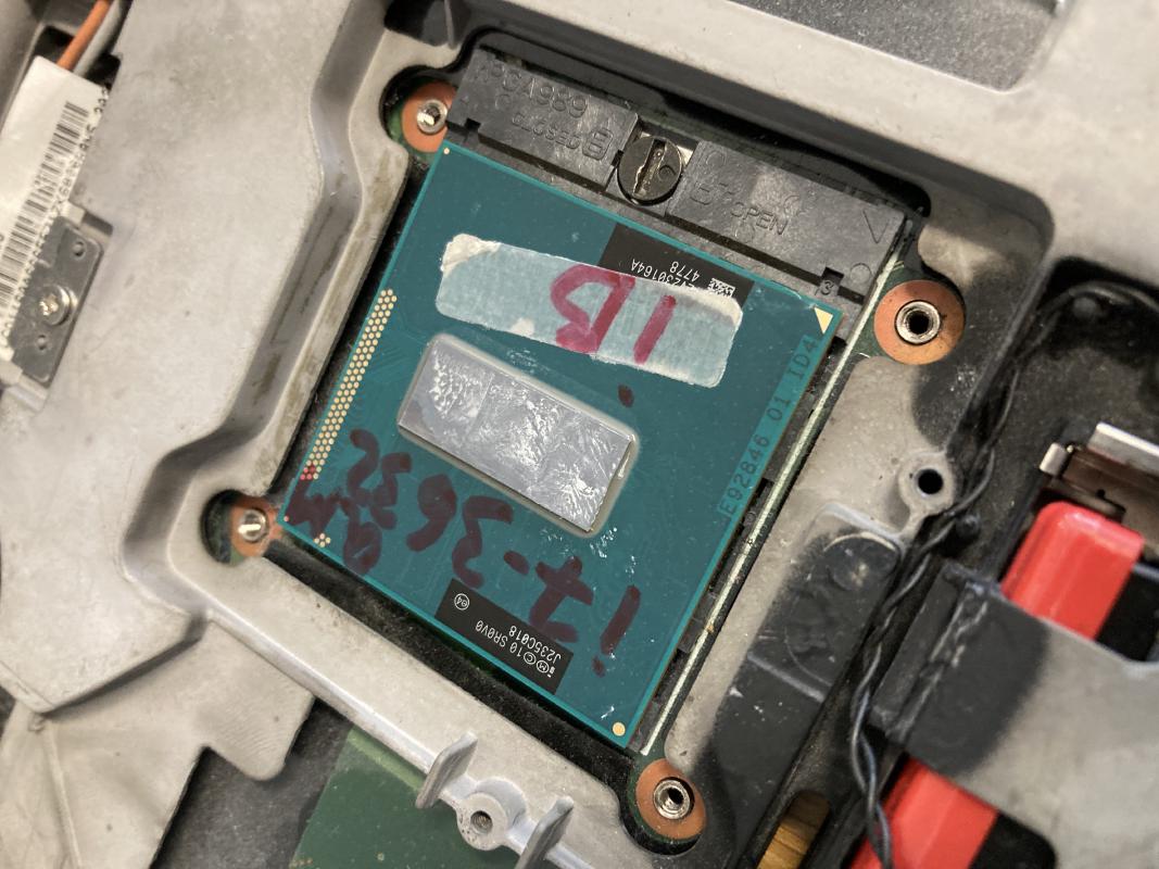Make sure the golden triangle aligns with the marking on the socket, and pop that new CPU in.