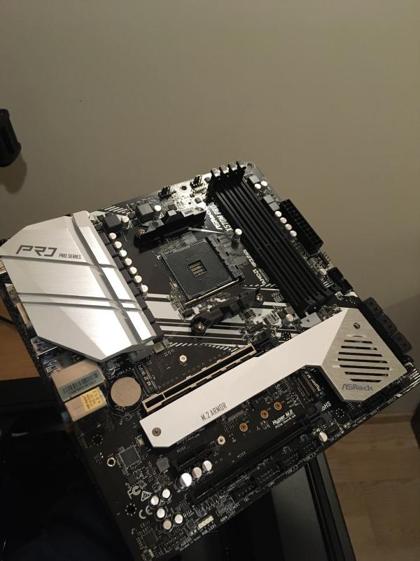 The heart of the new setup: ASRock X570M Pro4 motherboard.