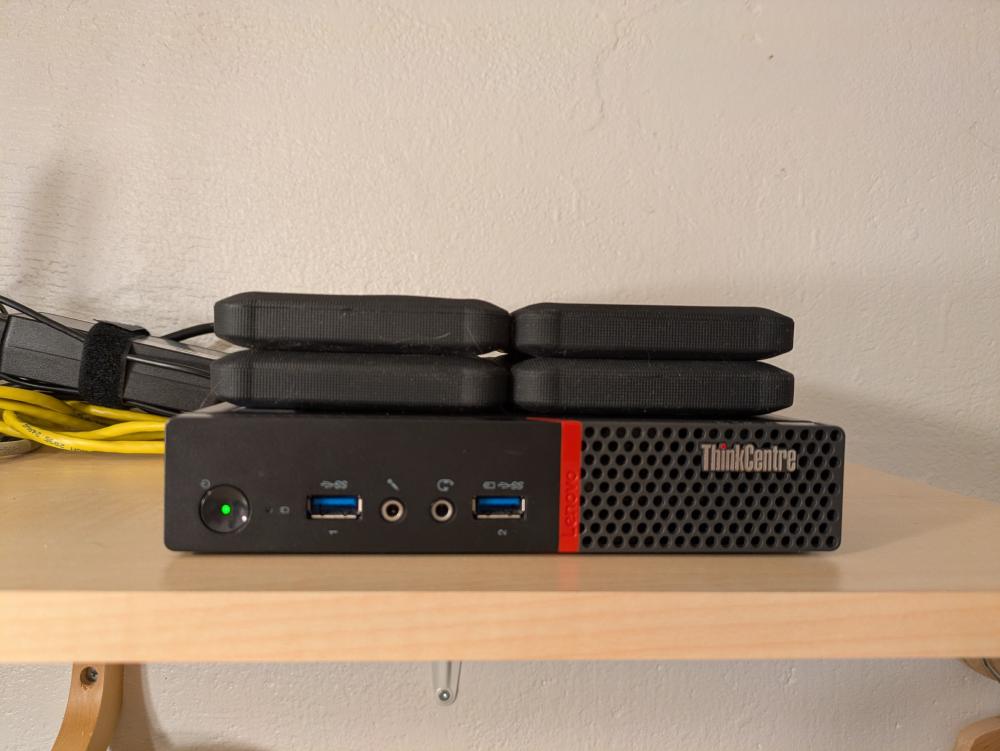 I liked how the drives fit on top of the PC here.