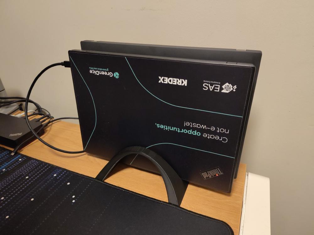 The dual vertical laptop stand, holding laptops.
