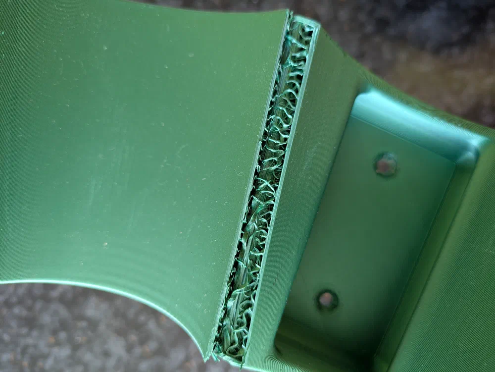 A broken Makita vacuum cleaner holder print. The patterns are interesting, though!