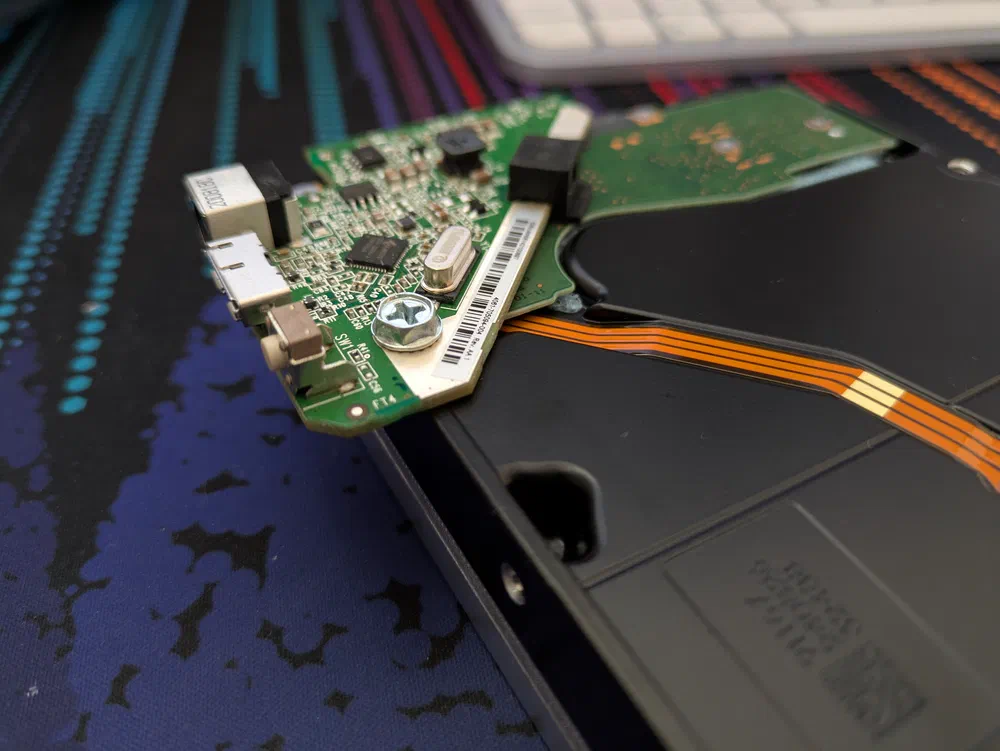 Those USB-SATA adapters from shucking are really darn handy now. Adapter courtesy of my brother-in-law.