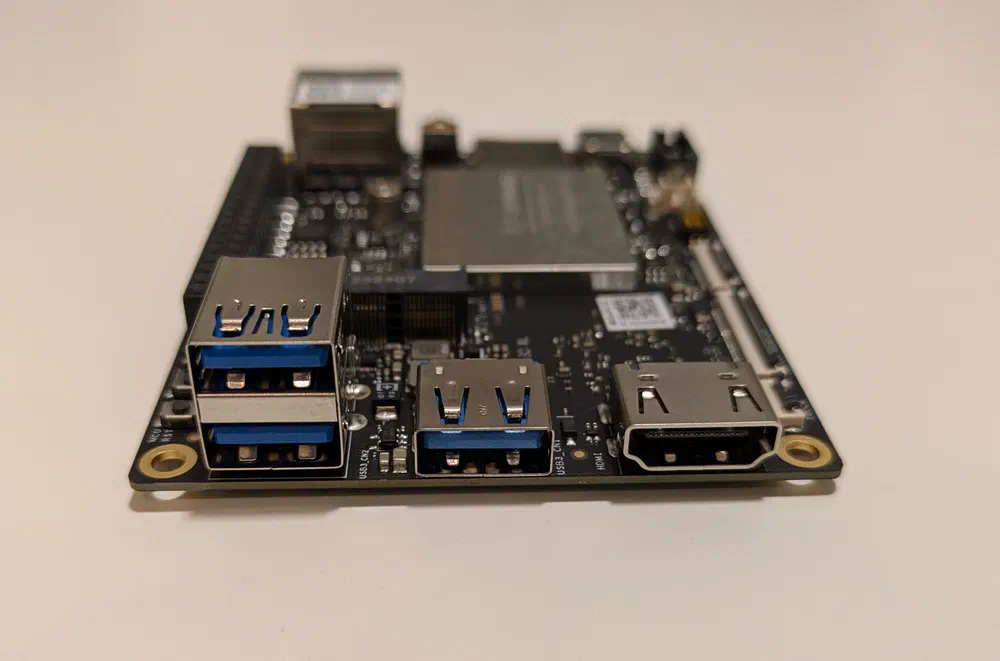 Side view, including three USB 3 10 Gbps ports, and a full-sized HDMI port.