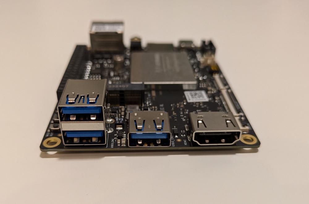 Side view, including three USB 3 10 Gbps ports, and a full-sized HDMI port.