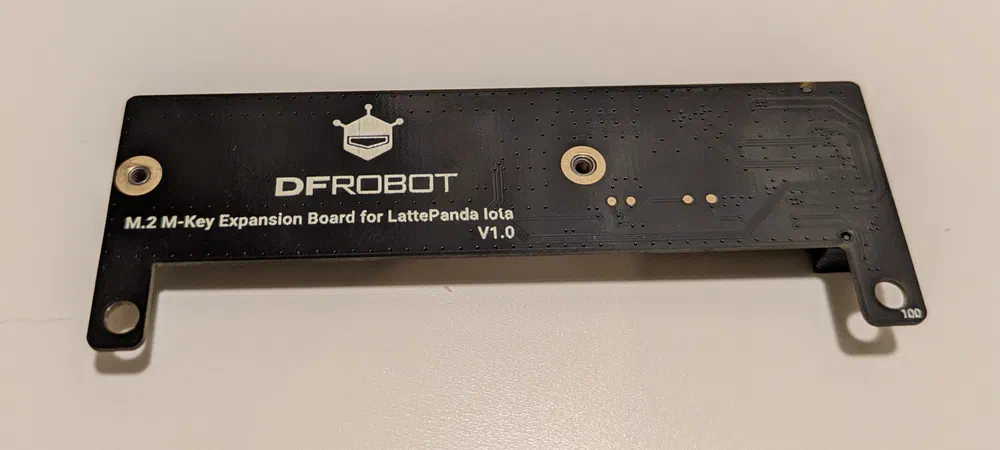 Bottom of the adapter (or top, depending on how you mount it).