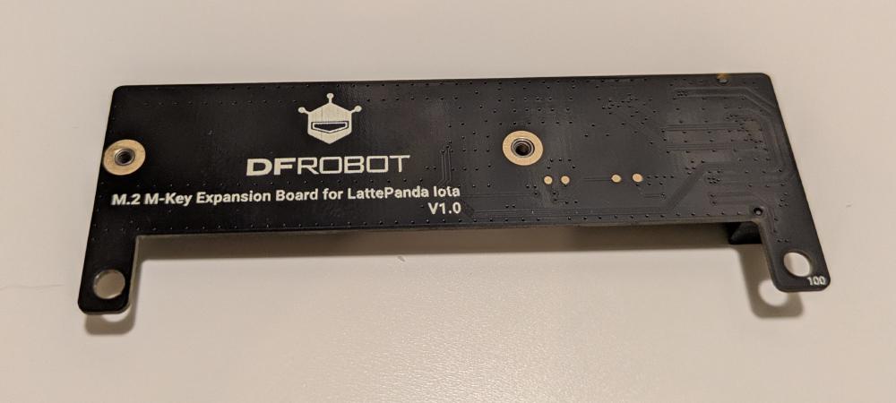 Bottom of the adapter (or top, depending on how you mount it).