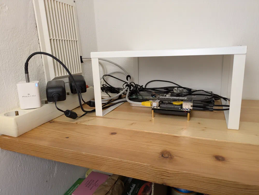 LattePanda IOTA, chilling in the pantry, below an IKEA Variera shelf thingy to fit more compute power on the shelf in
the near future.