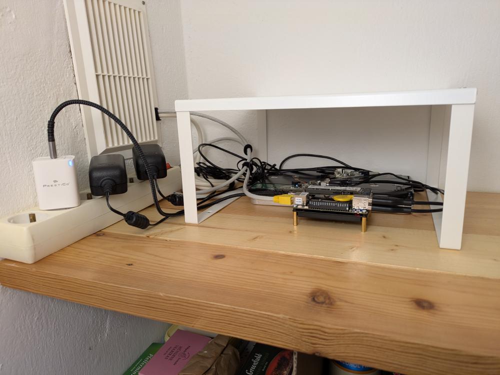 LattePanda IOTA, chilling in the pantry, below an IKEA Variera shelf thingy to fit more compute power on the shelf in
the near future.