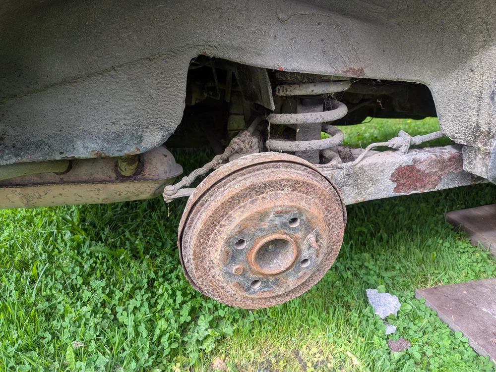 Right rear, before any work.