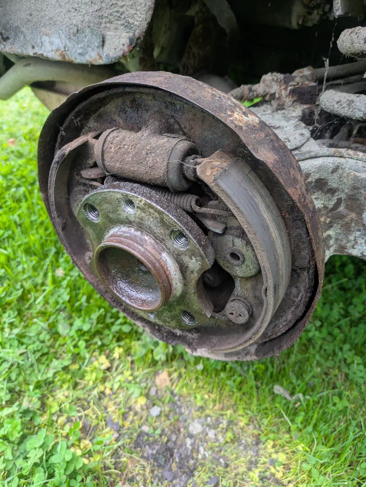 Rear brakes also have a small metal bit there. That's the handbrake. Yup.  