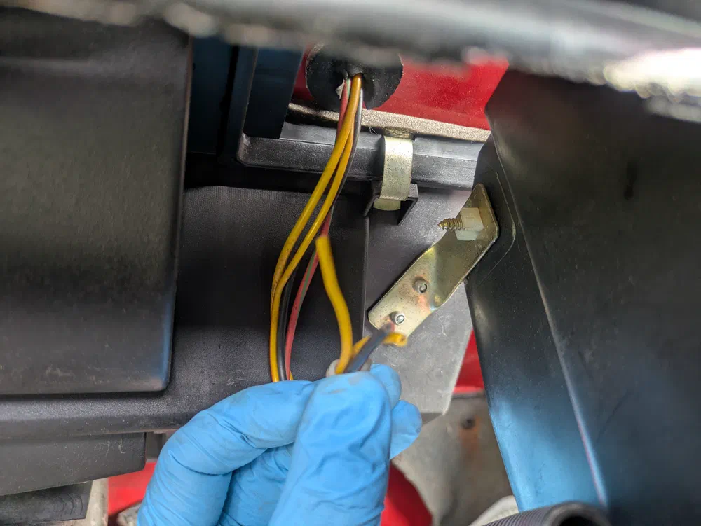 New mystery: why were these cut, and why do they go under the bonnet?