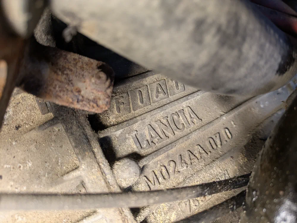 The engine has both FIAT and LANCIA logos on it.