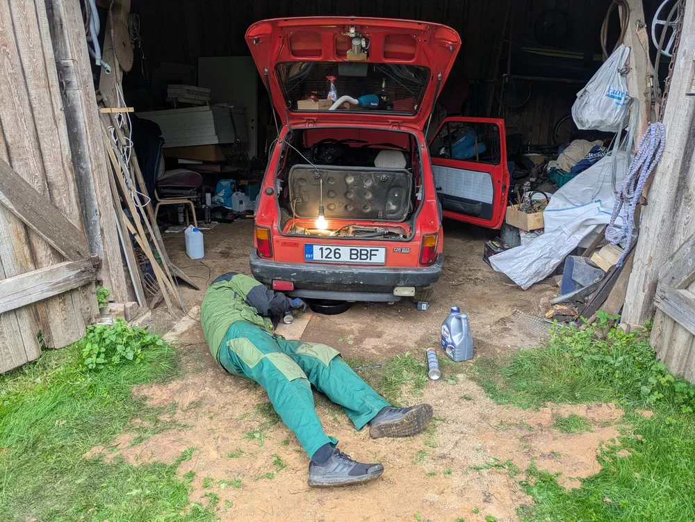 Oil change in progress, featuring my brother.