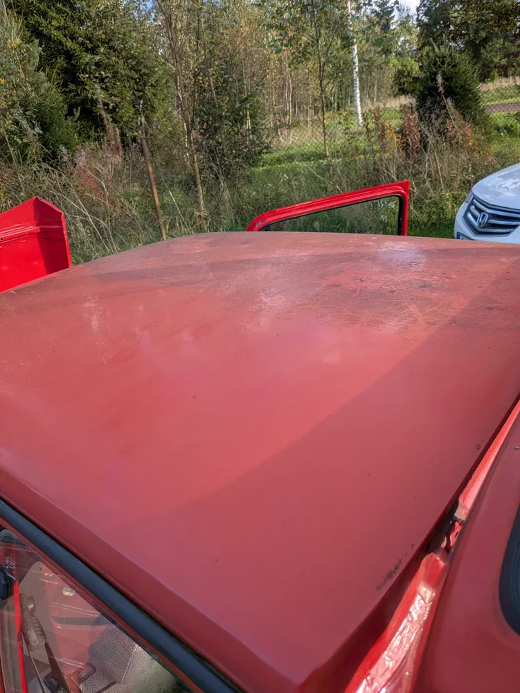 I got a wet rag and did a quick test on the roof to see what the car actually looks like behind all the crap. There's a
whole car behind that!